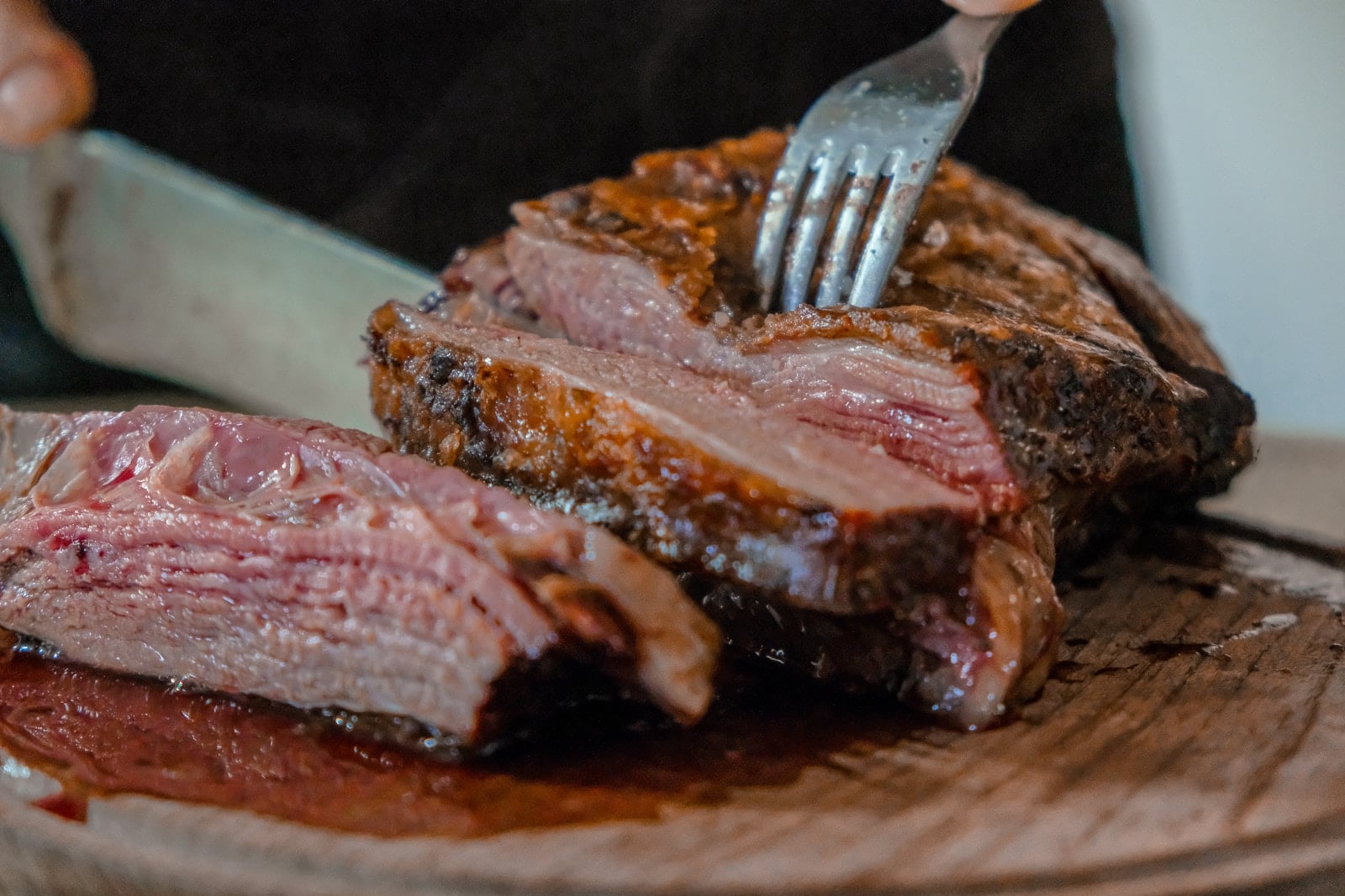Juicy roasted beef being carved