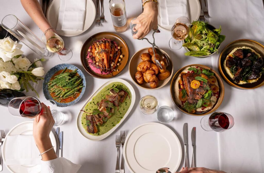 Elegant dining table with diverse dishes