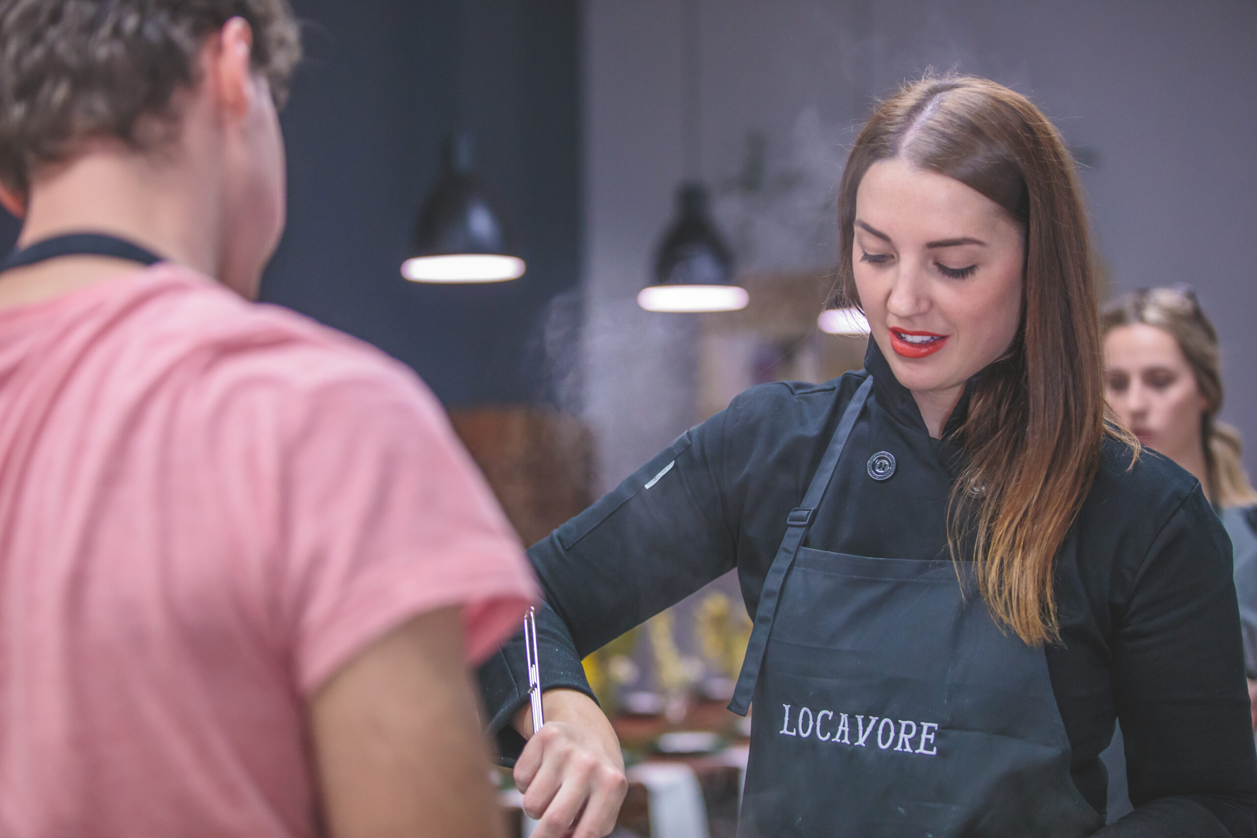 People cooking in kitchen