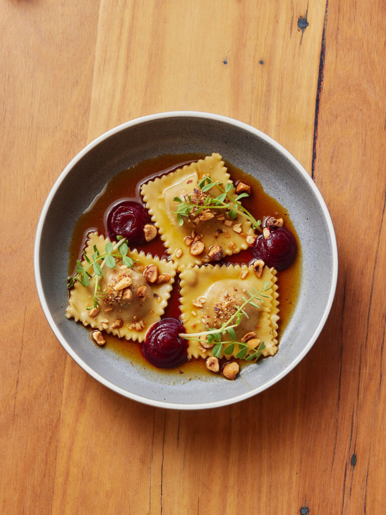 Ravioli with beets and hazelnuts