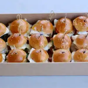 Box of mini slider sandwiches