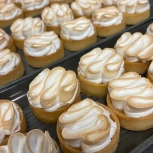 Mini meringue tarts displayed